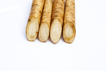 Burdock Root (Gobo) on white background.