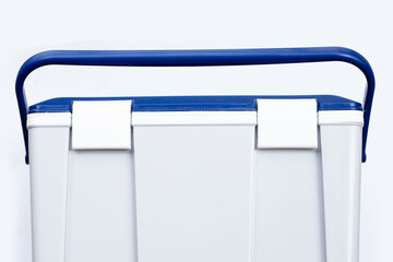 Handheld white blue refrigerator on white © Bowonpat