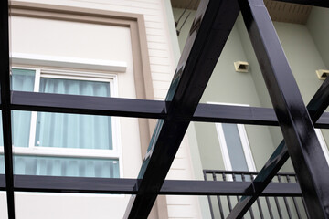 Fototapeta premium Steel roof structure. Build a room addition