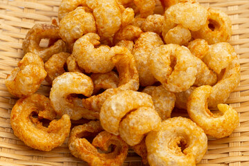 Crispy pork rinds or pork snack.