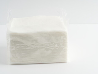 A pack of napkins on a white background. Space for text