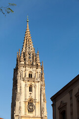 Fototapeta na wymiar antique church tower and blue sky, religious, european