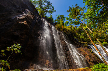 The beauty of the waterfall Goa Tetes. One of the waterfalls in the Tumpak Sewu waterfall complex, the area with many streams of water falling down. A famous tourist destination in Lumajang, Indonesia