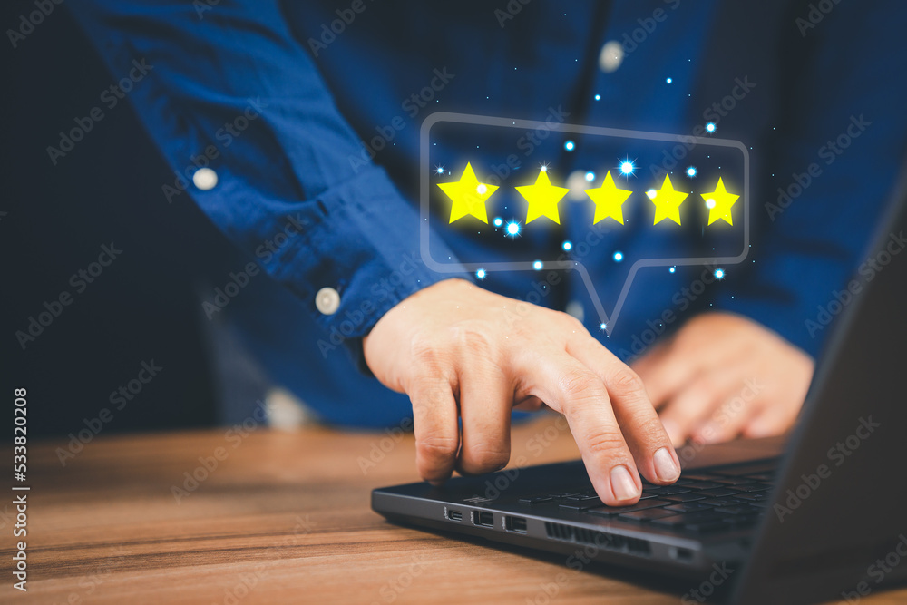 Poster Man using laptop computer to rate service experience in application online. Customer reviews opinion poll satisfaction survey and testimonial.