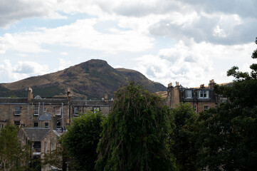 Fototapeta na wymiar New town in Edinburgh city, view on houses, hills and trees in old part of the city, Scotland, UK