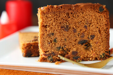 Carrot and dates cake made dried fruit, raisins, cashew nuts almond. Tasty home made flavored cinnamon , spices Christmas new year Kerala India Sri lanka. Sweet dessert food.