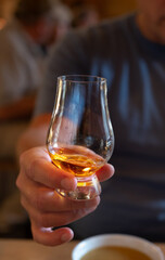 Tasting of single malt scotch whisky in whiskey bar in Edinburgh, UK