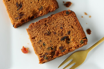 Carrot and dates cake made dried fruit, raisins, cashew nuts almond. Tasty home made flavored cinnamon , spices Christmas new year Kerala India Sri lanka. Sweet dessert food.