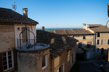 VIew on medieval buildings in sunny day, vacation destination wine making village Chateauneuf-du-pape in Provence, France