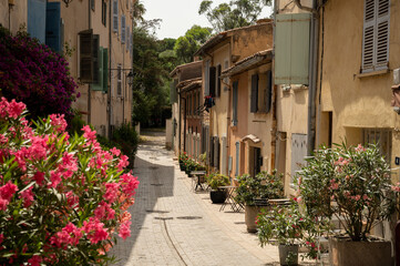 Colorful houses in Saint Tropez, village on Mediterranean sea with yacht harbour, Provence, France