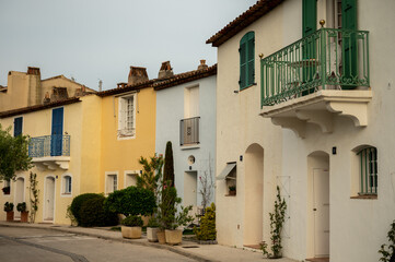 Colorful houses in Port Grimaud, village on Mediterranean sea with yacht harbour, Provence, France