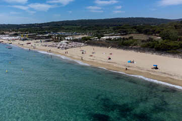 Aerial view of legendary Pampelonne beach near Saint-Tropez, summer vacation on white sandy beaches of French Riviera, France