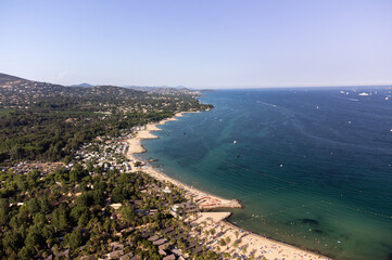 Fototapeta premium Aerial view on Gulf of Saint-Tropez, sail boats, houses of Port Grimaud and Port Cogolin, summer vacation in Provence, France