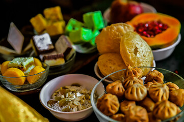 Lovely Indian Traditional Sweets For Holidays and Festivals. Beautiful glass bowl.  Wooden Tray. Fresh Happy Colors. Worship With Favourit Food of Main Hindu God and Goddess. Colorful Food Wallpaper 