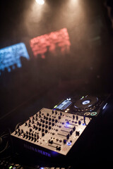 Close up of DJ console during party concert, music, electronic music, rave