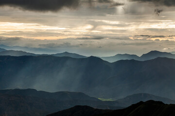 Obraz premium Landscape of smoky Andean mountains golden hour, dusk in Loja, Ecuador