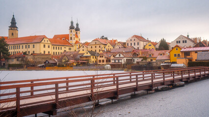 Telc , beautiful  old town , buildings along the river during winter morning : Telc , Czech  : December 14, 2019