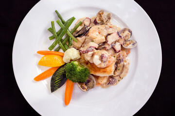 overhead shot of gourmet seafood shrimp squid fish ecuador