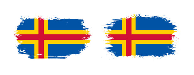 Set of two grunge brush flag of Aland Islands on solid background