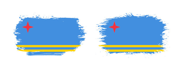 Set of two grunge brush flag of Aruba on solid background