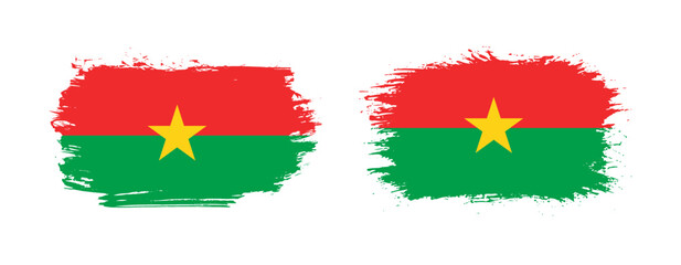Set of two grunge brush flag of Burkina Faso on solid background