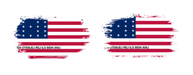 Set of two grunge brush flag of Bikini Atoll on solid background