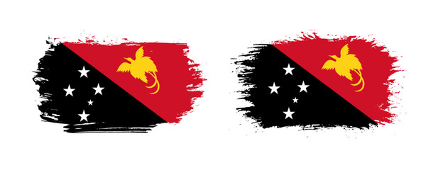 Set of two grunge brush flag of Papua New Guinea on solid background