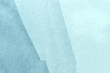 Abstract art background light blue colors. Watercolor painting on canvas with soft denim gradient.