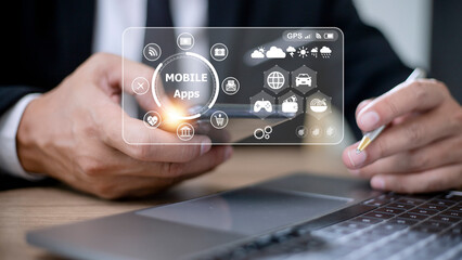 mobile apps concept.Business man hands holding touch screen smartphone outside in the park,color filter,all element graphic are made up by me