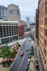 City view of Downtown Detroit in the summer on a cloudy day taken from the Scott Building