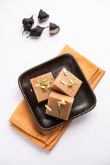 Singhara Barfi or Singhada burfi or halwa made using water chestnut flour, fasting or upwas food