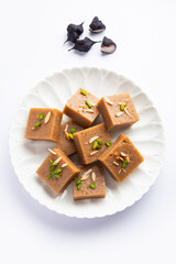 Singhara Barfi or Singhada burfi or halwa made using water chestnut flour, fasting or upwas food