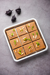 Singhara Barfi or Singhada burfi or halwa made using water chestnut flour, fasting or upwas food