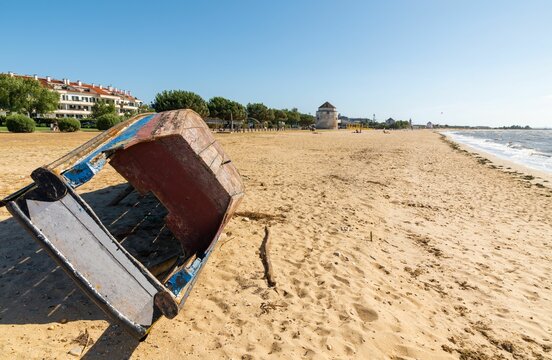 Old boat on Moinhos beach in Alcochete village, Portugal