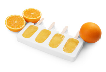 Fototapeta Tasty orange ice pops in mold isolated on white. Fruit popsicle obraz