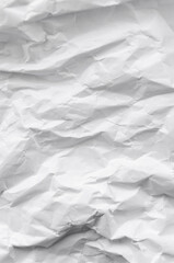 Crumpled white paper background or backdrop with copy space