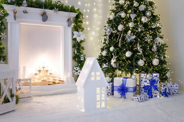 Decorative fireplace with candles and wood, wrapped present boxes under Christmas tree with baubles...