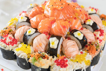 Assorted sushi nigiri and maki big set on slate. A variety of Japanese sushi with tuna, crab, salmon, eel and rolls. Top view. Image of japan food. selective focus.