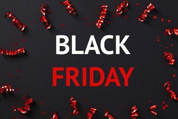 Black Friday Sale banner design with red party streamers and confetti on black background.