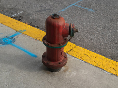 A Red Fire Hydrant On The Sidewalk In Royal Oak, Michigan