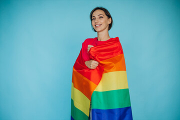 Woman waving lgbt colorful flag for equal right