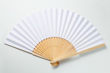Chinese folding fan isolated on white background - obrazy, fototapety, plakaty
