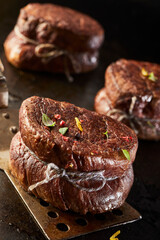 Fried meat medallion on spatula