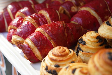 Freshly baked sweet buns with raisins.