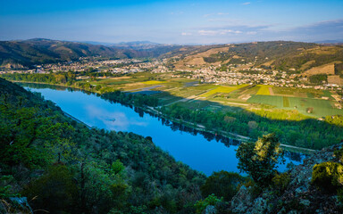 View on the Rhone river and its valley full of vineyards from the Pierre Aiguille in Tain...