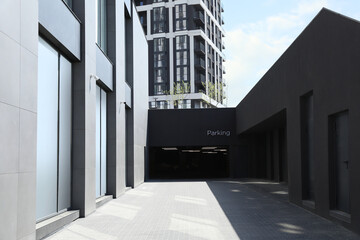 Parking garage with metal gate in modern building