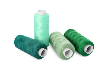 Different colorful sewing threads on white background