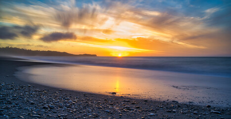 Obraz premium Sunset at Gillespie's Beach, West Coast, New Zealand