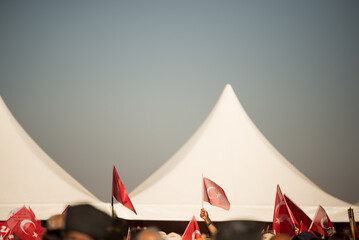 Close up shot of Turkish flags in a crowded people at the celebrations of liberation day Izmir...