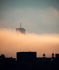 foggy sunrise in the city